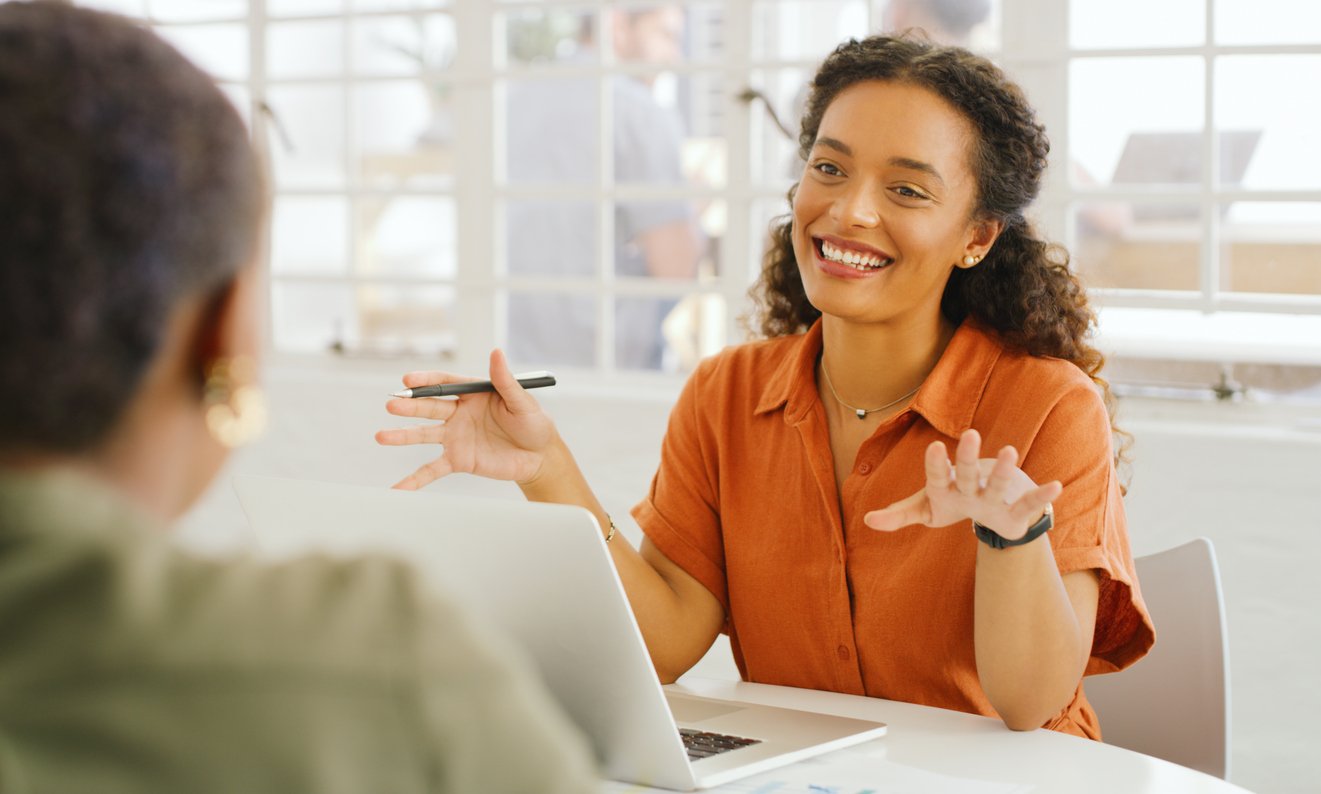 Shot of two young businesswomen having a meeting in a modern office